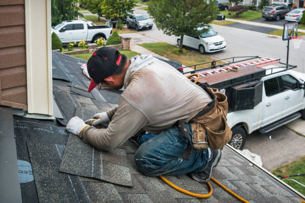 Professional Gutter Installation technician working in Boxford, MA